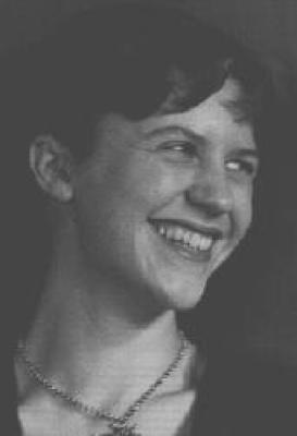 Black and white photograph of Sylvia Plath smiling